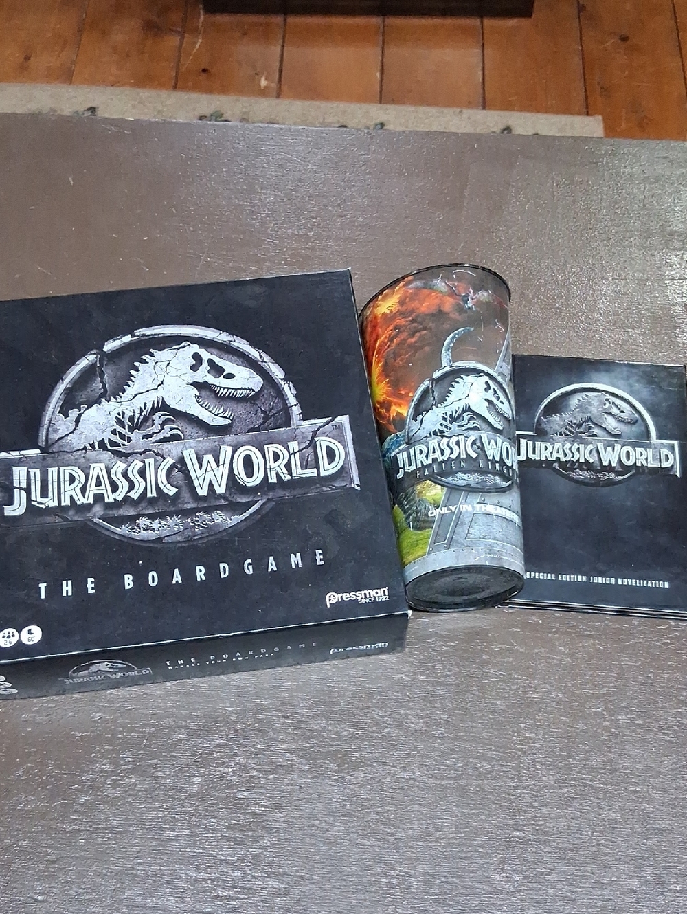 NEW JURASSIC WORLD BOARD GAME with dinos & VHS tapes